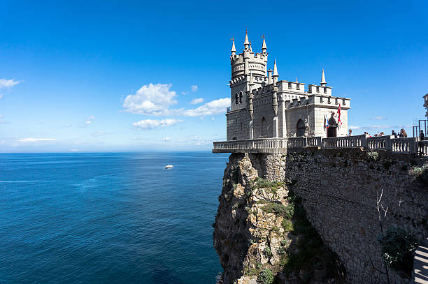 swallow's nest swallow's nest is an ancient castle on a rock, the symbol of the Republic of Crimea on the background of blue sea. Yalta crimea photos stock pictures, royalty-free photos & images