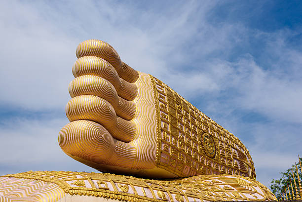 istock Foot print big statue of reclining buddha image 478458620