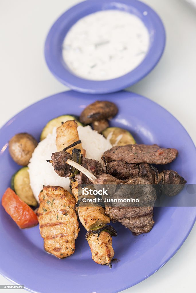 Middle Eastern Dinner grilled lamb chops, chicken and beef kebab, and grilled ground chicken and beef meat with rice and vegetables Beef Stock Photo