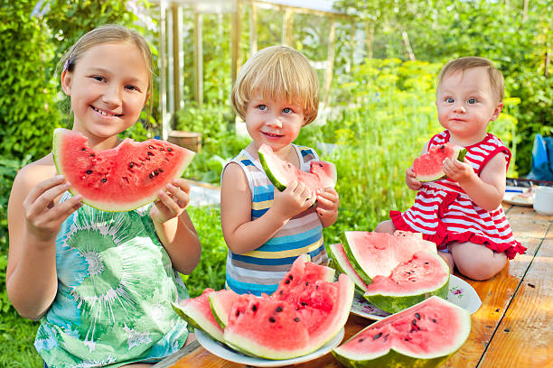 istock Family with watermelon 478459117