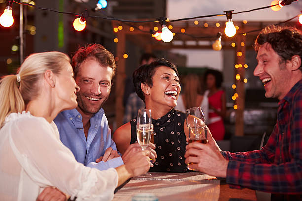 istock Group of friends at rooftop party 478459240