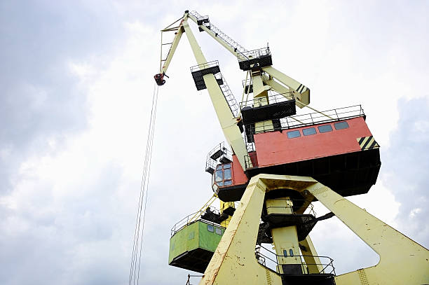 istock Industrial port cranes for containers 478463674