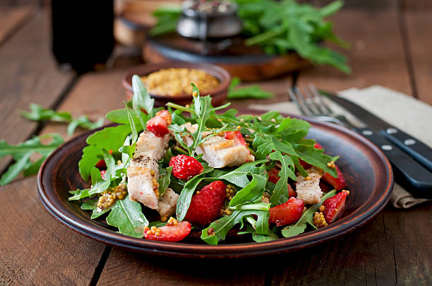 istock Chicken salad with arugula and strawberries 478467936