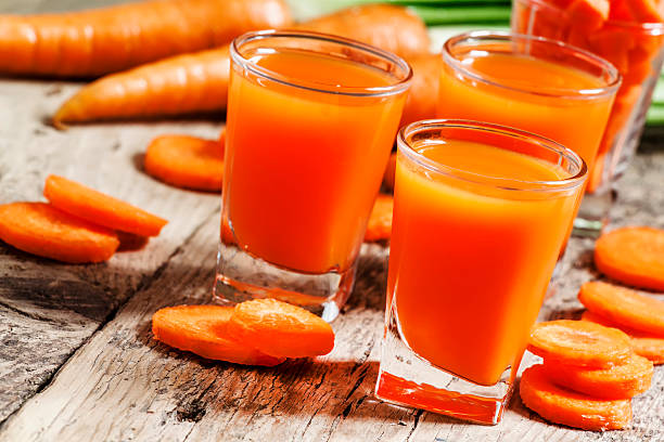 istock Fresh carrot juice in the glass 478475924