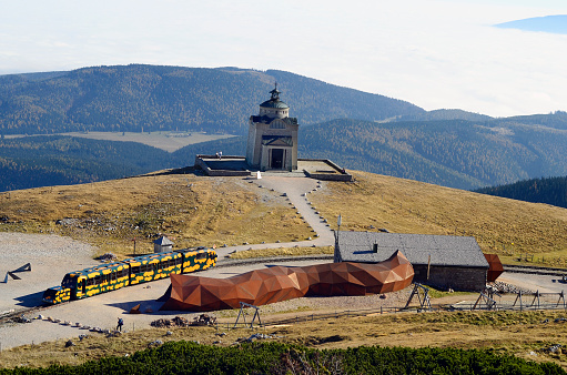 Puchberg, Austria - October 24th 2012: Rack railway named Salamander on mountain station on Schneeberg and Elisabeth chapel