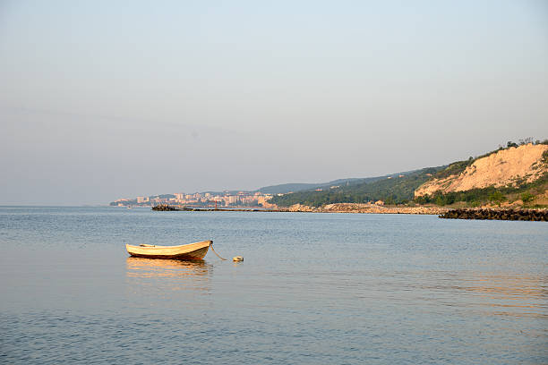 Boat in Black Sea. Golden Sands resort in the background.