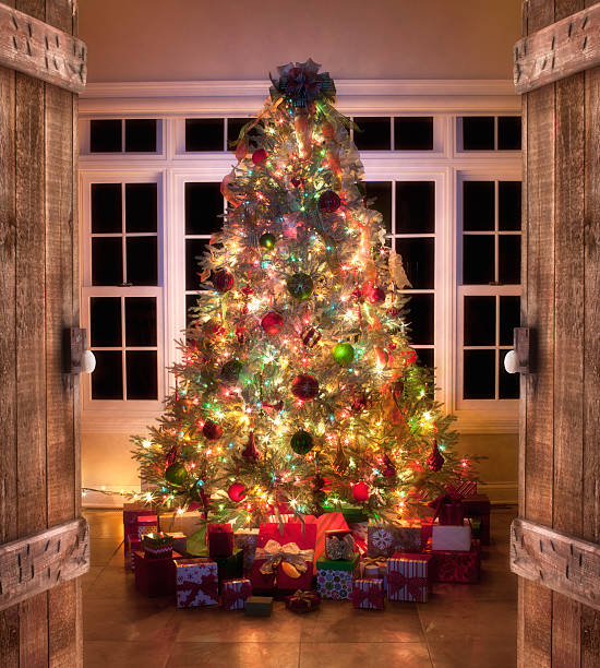istock Christmas Tree in a Room with Windows and Rustic Doors 478480384