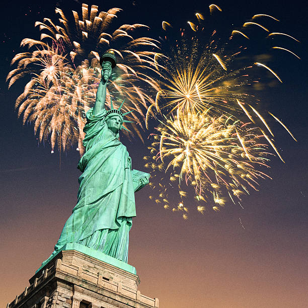 istock fireworks behind the statue of liberty 478482450