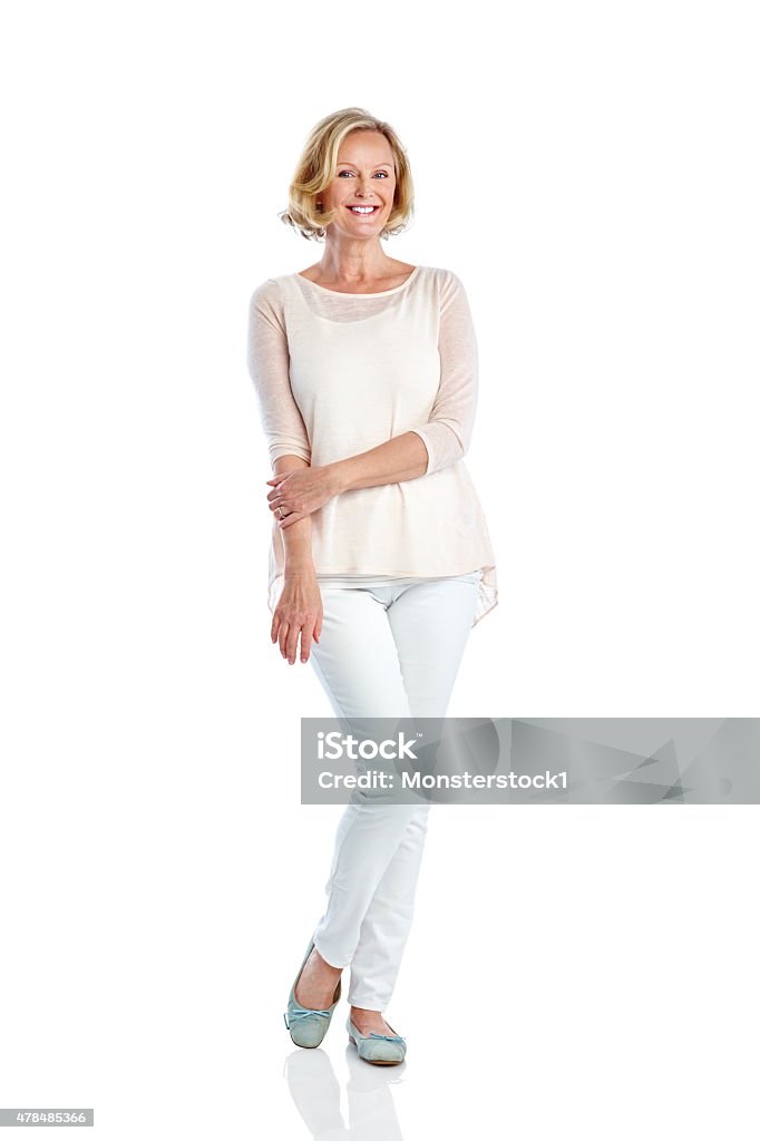 Atractiva mujer madura posando sobre blanco - Foto de stock de Mujeres libre de derechos