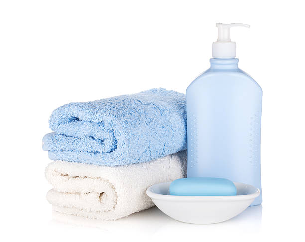 istock Shampoo bottle and soap with towels 478485480