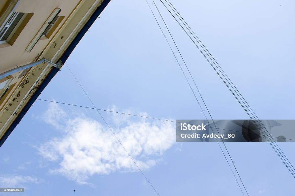 gutter under a cloudy blue sky 2015 Stock Photo