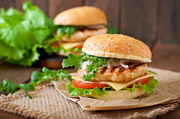 istock Sandwich with chicken burger, tomatoes, cheese and lettuce 478486982