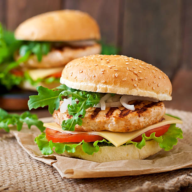 istock Sandwich with chicken burger, tomatoes, cheese and lettuce 478486984