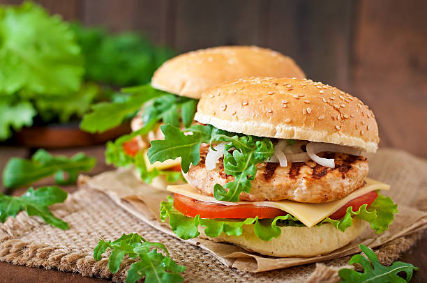 istock Sandwich with chicken burger, tomatoes, cheese and lettuce 478486988