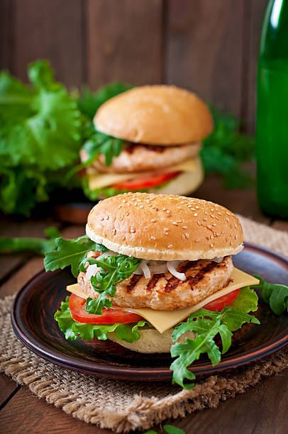 istock Sandwich with chicken burger, tomatoes, cheese and lettuce 478486994