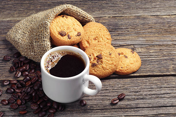 istock Cup of coffee and cookies 478487093