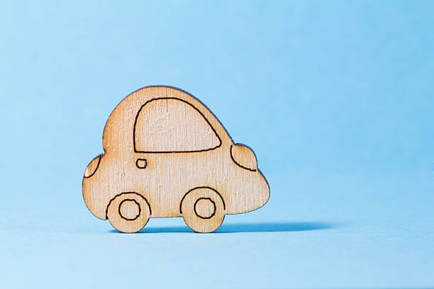 istock Wooden car icon on blue background 478491786