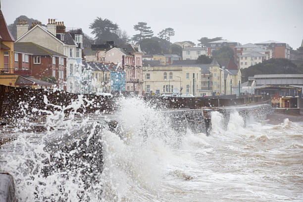 istock Large Waves Breaking Against Sea Wall At Dawlish In Devon 478492698