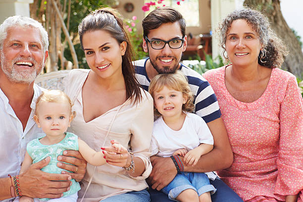 istock Multi Generation Family Sitting Outdoors At Home Together 478492724