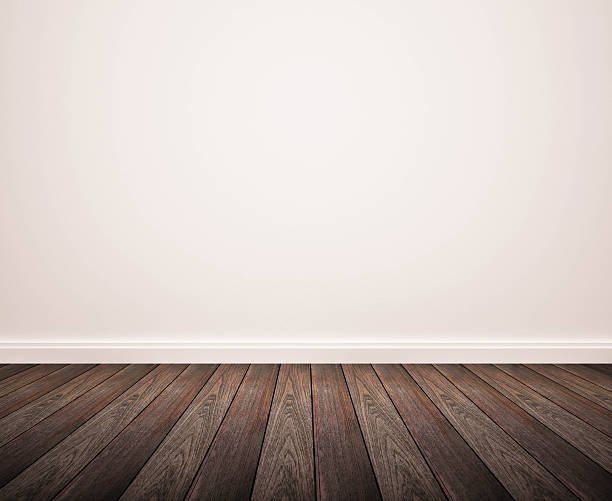 istock hardwood floor and white wall 478495156