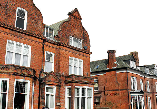 istock Red brick houses in street 478496381