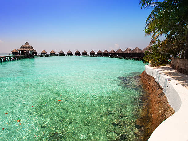 Water slides at over water villas in Maldives