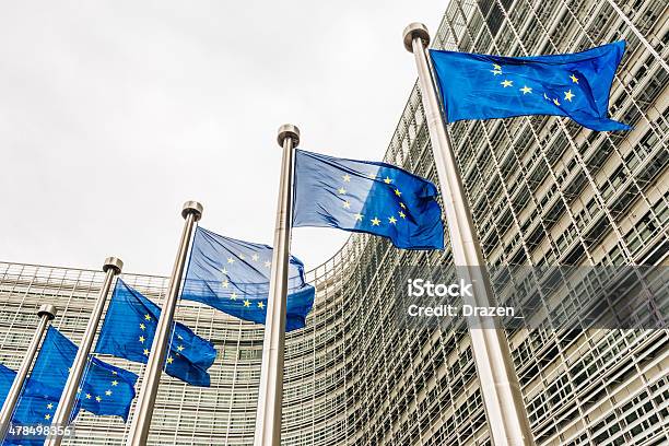 Eu Flags Near Eu Headquarters Berlaymont European Commission Building Stock Photo - Download Image Now