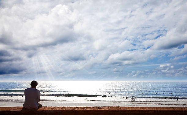 istock Man sitting on the beach, relaxing. 478500103