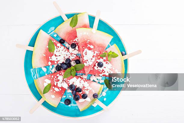Fresh Watermelon Popsicles With Blueberries Stock Photo - Download Image Now - 2015, Blueberry, Cheese