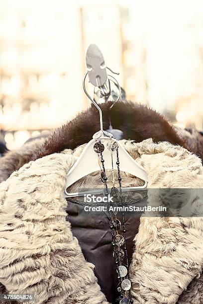 Winter Jacket With Fur Collar On A Flea Market Stock Photo - Download Image Now - 2015, Abundance, Car Trunk Sale