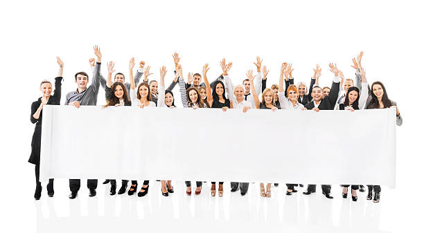 istock Cheerful business people holding banner. 478507043