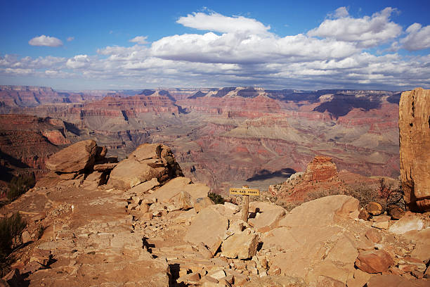 Sunny Grand Canyon View of the trail going down into the grand Canyon south kaibab trail stock pictures, royalty-free photos & images