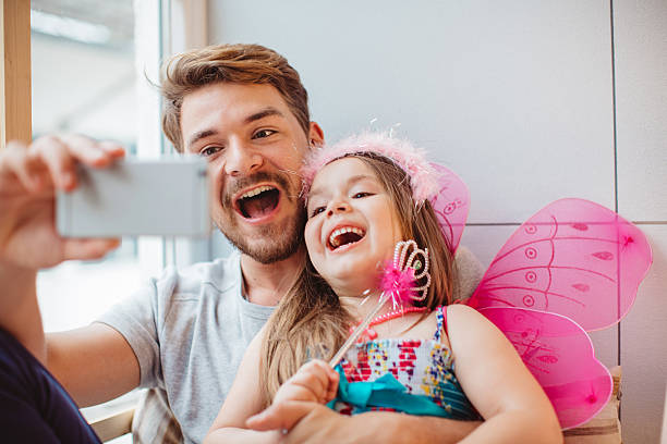 istock Father and daughter enjoying at home. 478514308