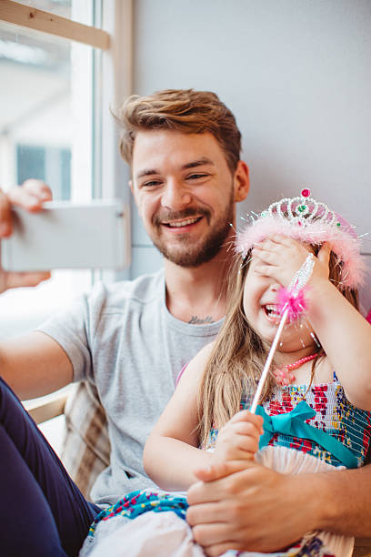 istock Father and daughter enjoying at home. 478514312