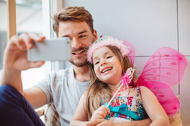 istock Father and daughter enjoying at home. 478514320