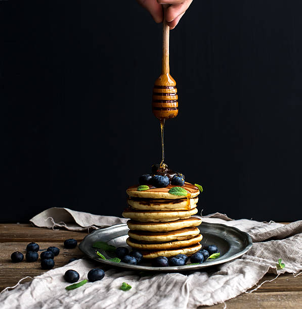 istock Breakfast set. Thin crepes with red caviar on rustic metal 478519766
