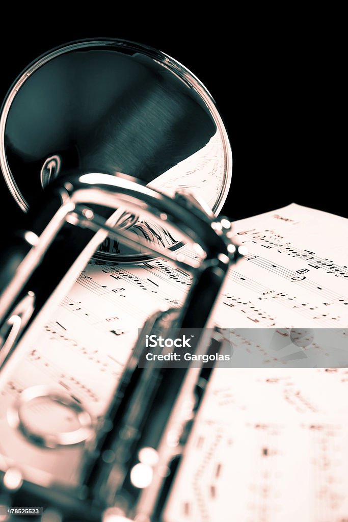 Trumpet closeup with music sheet Arts Culture and Entertainment Stock Photo