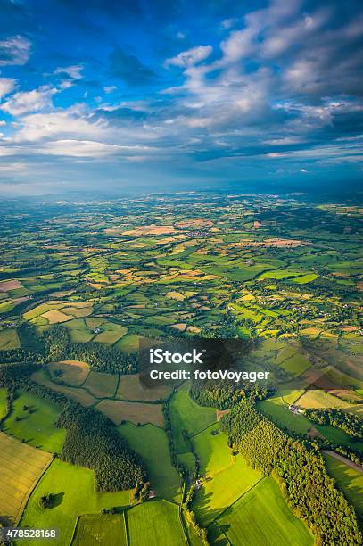 Aerial Vista Across Green Summer Landscape Under Big Country Skies Stock Photo - Download Image Now