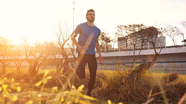 istock young athlete running in the park 478529122