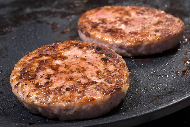 istock Hamburgers on the grill 478530250