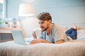 Young man enjoying at home.