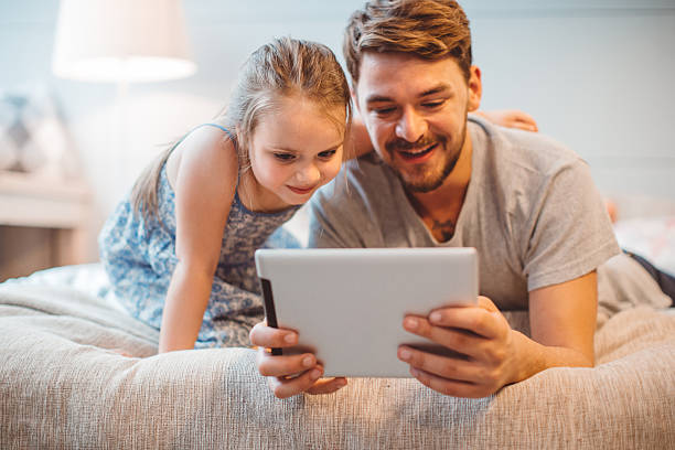 istock Father and daughter enjoying at home. 478533834