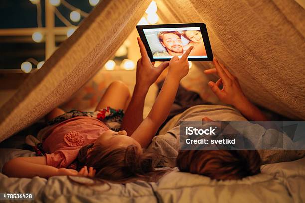 Father And Daughter Enjoying At Home Stock Photo - Download Image Now - Family, Digital Tablet, Child