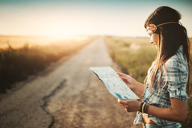 istock Traveler girl looking map 478537080