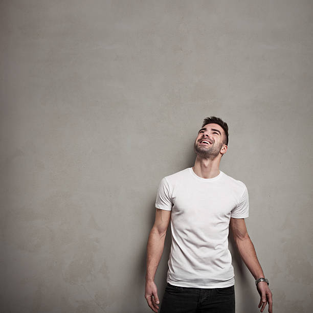 istock Smiling man in blank t-shirt 478539626