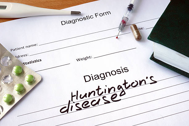 istock Diagnosis Huntington disease  and pills. 478540232