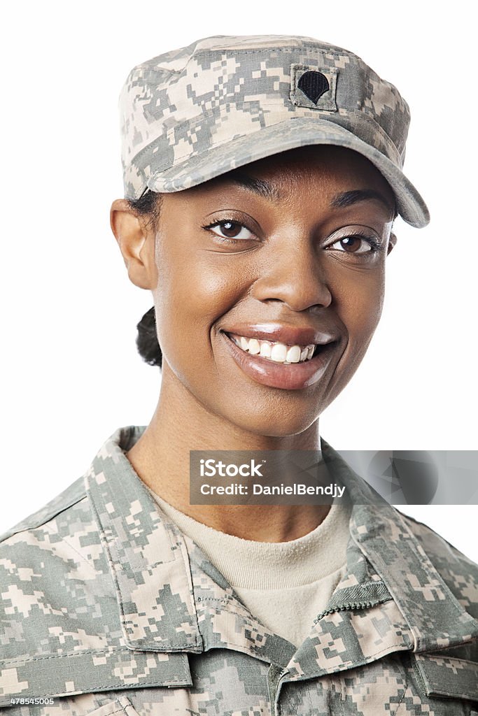 Portriat of a female soildier Female African American soldier in army camouflage uniform or ACU and patrol cap. One Woman Only Stock Photo