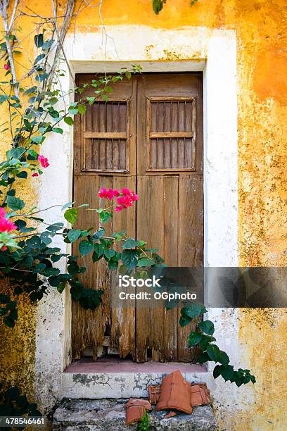 Door Of An Old Abandoned Yellow Building Xxxl Stock Photo - Download Image Now - Mexico, House, Bougainvillea