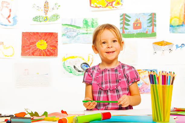 istock Little cute girl drawing 478547219
