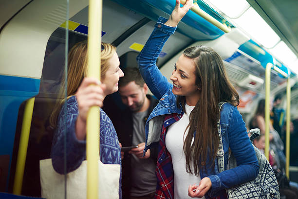 istock Meeting old friends in the subway 478553194